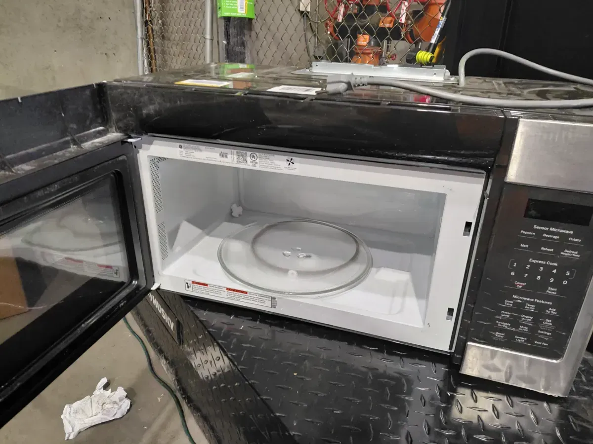 GE Over-the-Range Sensor Microwave Oven - image 1