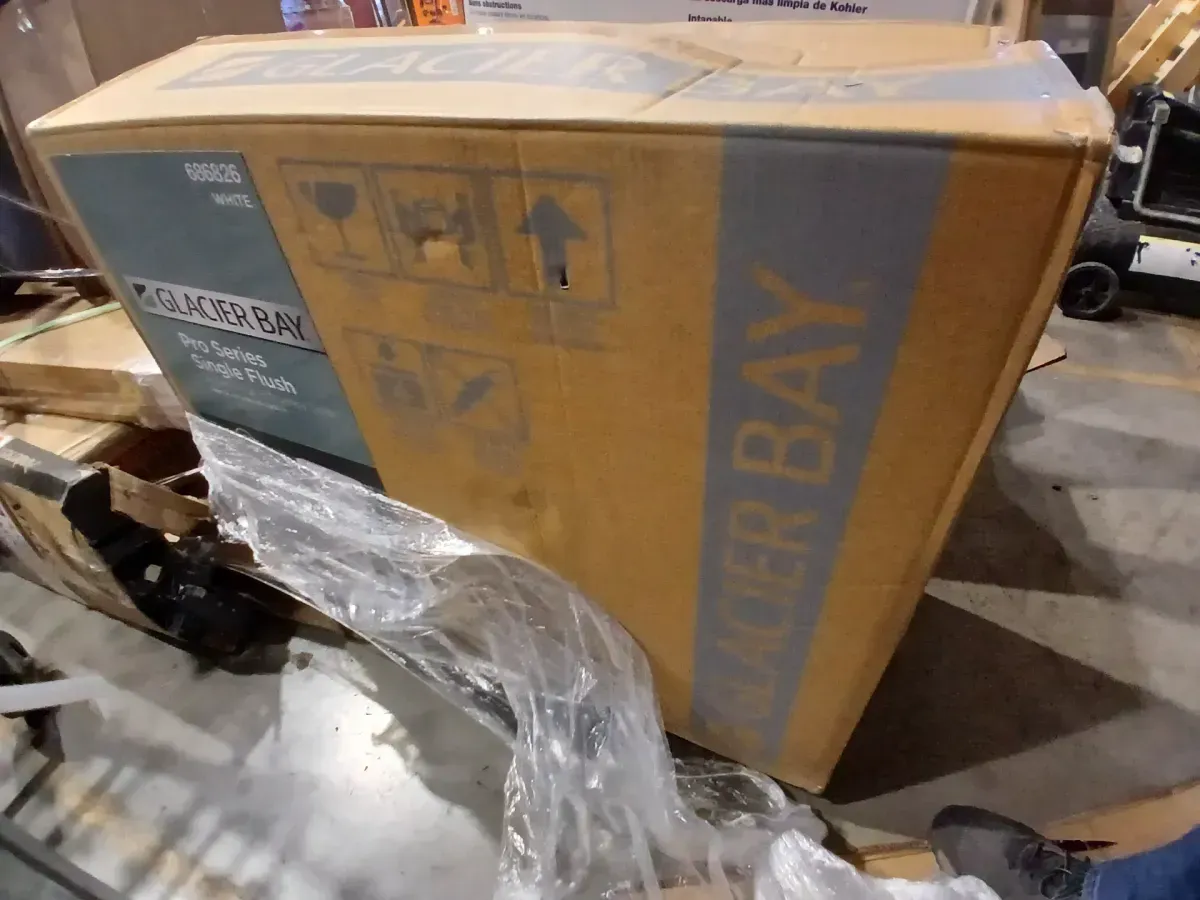 Glacier Bay 12 in. Rough In Two-Piece 1.28 GPF Single Flush Elongated Toilet in White, Seat Included - image 1