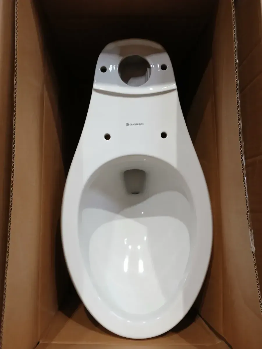 Glacier Bay 12 in. Rough In Two-Piece 1.28 GPF Single Flush Elongated Toilet in White, Seat Included - image 5