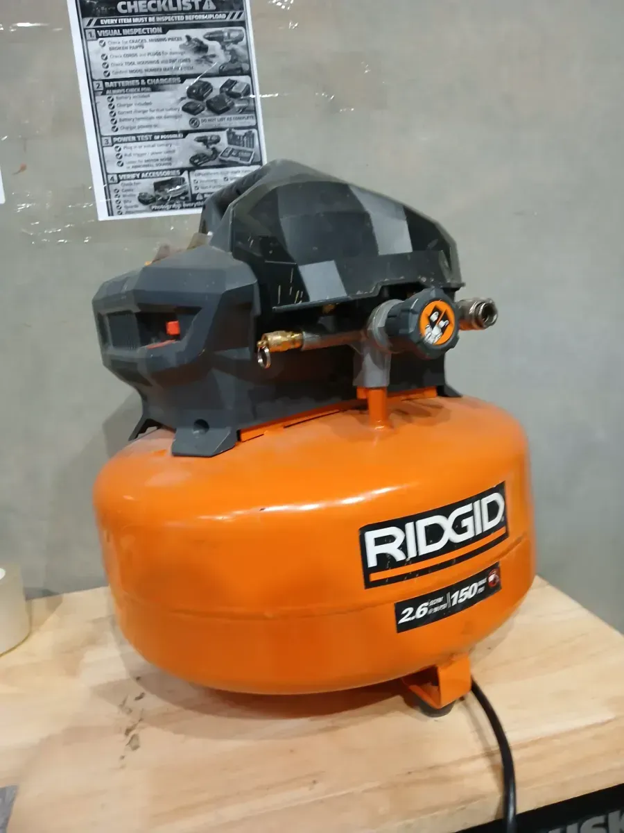 RIDGID 6 Gal. 150 PSI Portable Electric Oil-Free Jobsite Pancake Air Compressor with Dual Pressure Gauges and 2-Quick Couplers - image 1