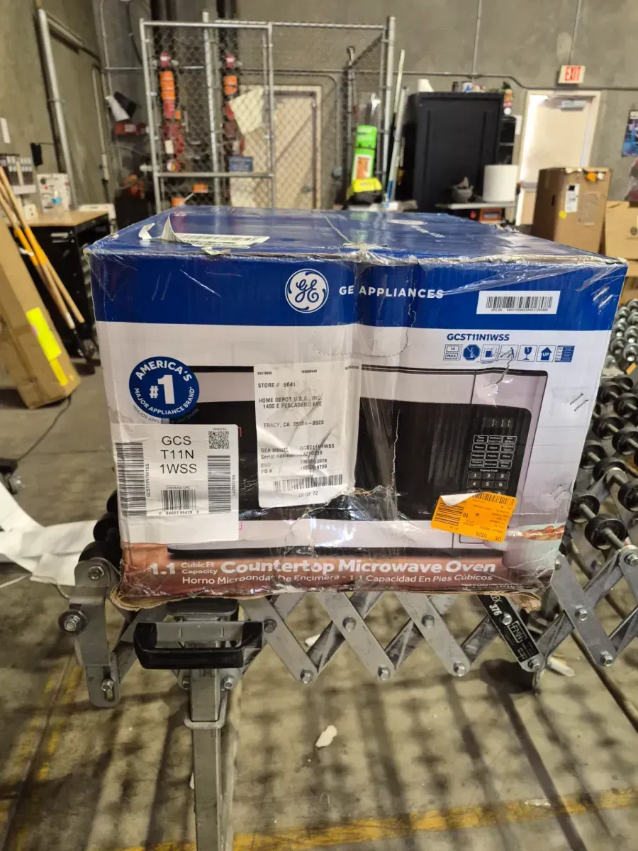 GE 1.1 Cu. Ft. Capacity Countertop Microwave Oven - image 4