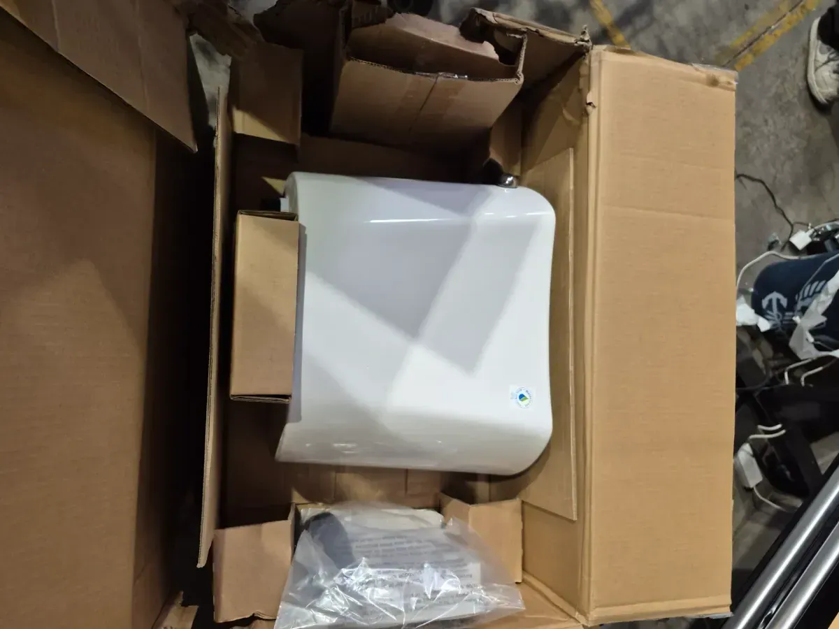 Glacier Bay 12 in. Rough In Two-Piece 1.28 GPF Single Flush Round Toilet in White, Seat Included - image 2