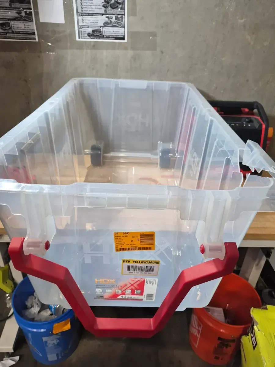 40 Gal. Tough Storage Tote with Wheels and Handle in Clear and Red - image 2