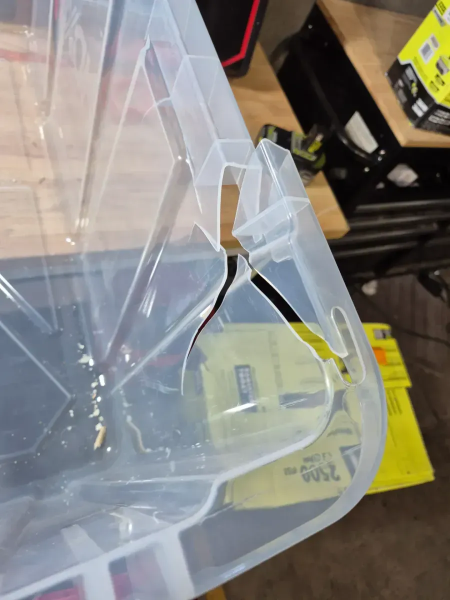 40 Gal. Tough Storage Tote with Wheels and Handle in Clear and Red - image 4