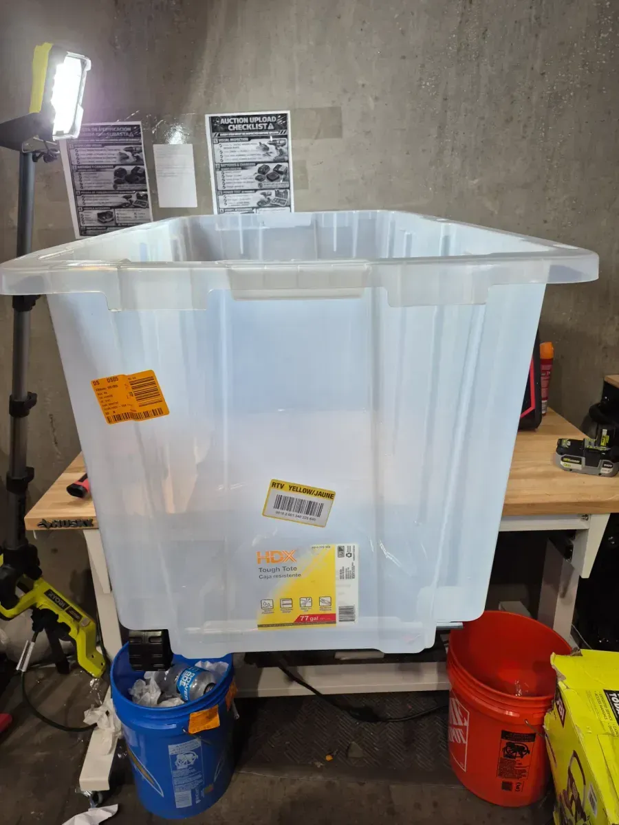 77 Gal. Tough Storage Tote with Wheels in Clear with Red Lid - image 2
