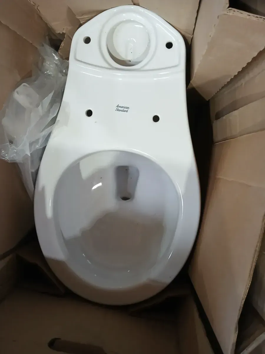 Reliant 12 in. Rough In 2-Piece 1.28 GPF Single Flush Round Toilet with Slow Close Seat in White - image 4