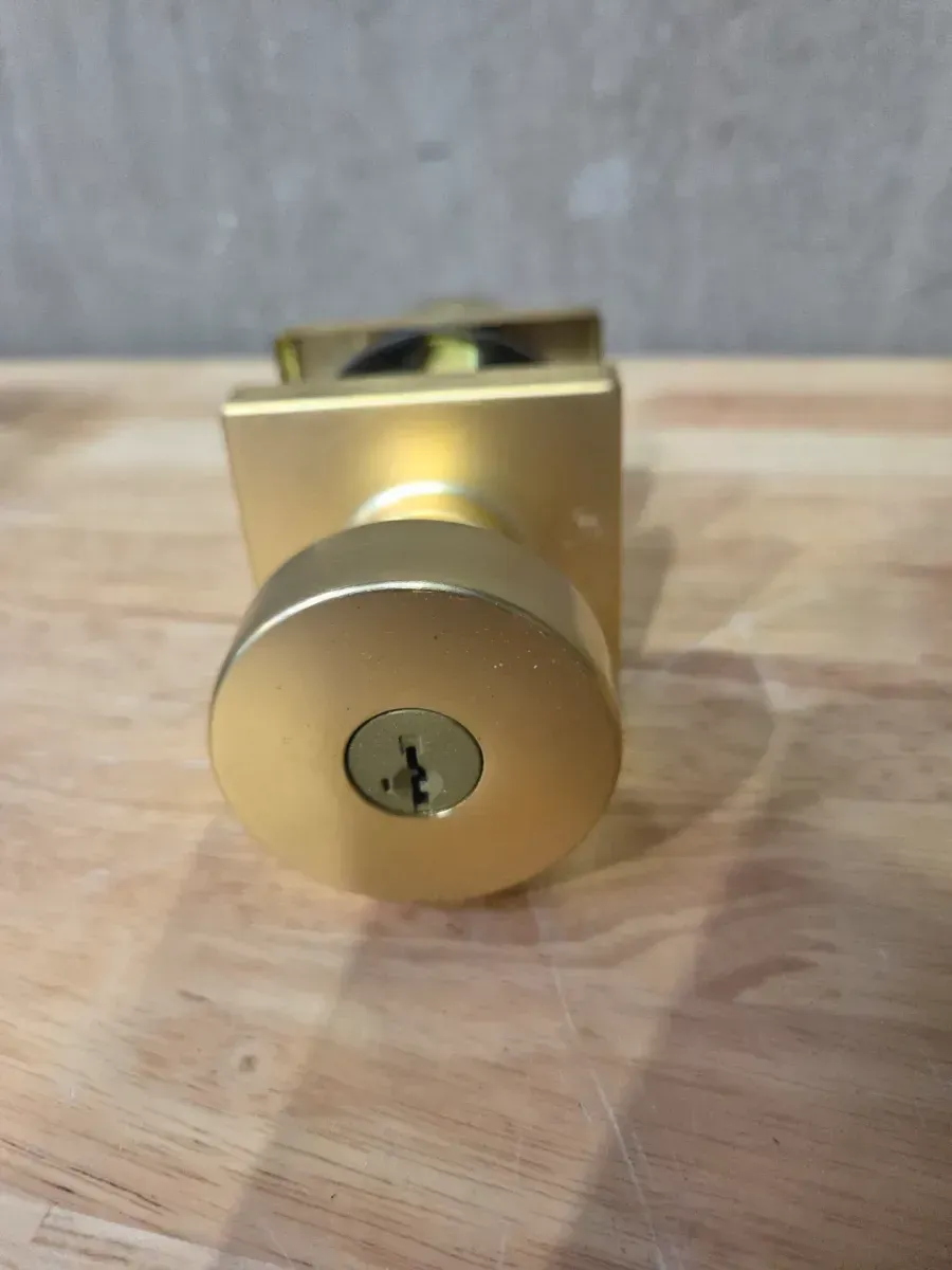 Modern Keyed Entry Door Knob with Square Rosette in Satin Brass - image 3