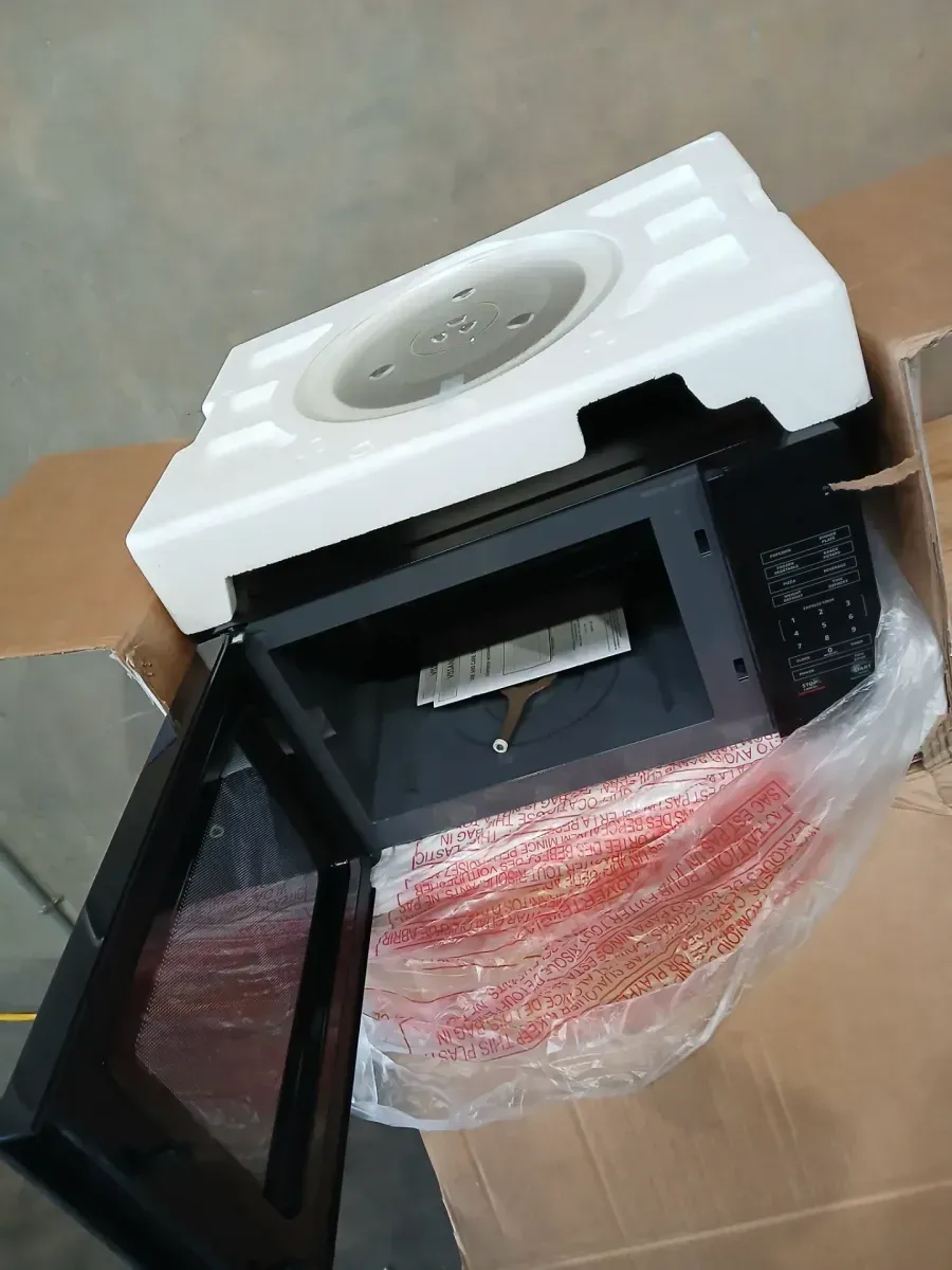 1.1 cu. ft. Countertop Microwave Oven in Black - image 4