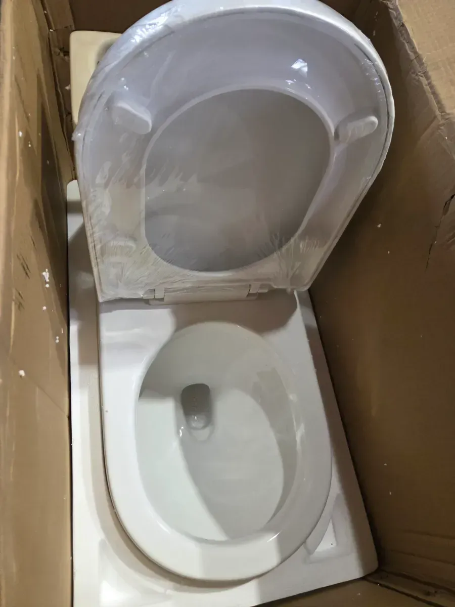 One-Piece 1.1/1.6 GPF Dual Flush Round Toilet in White Soft Close Seat Included - image 3