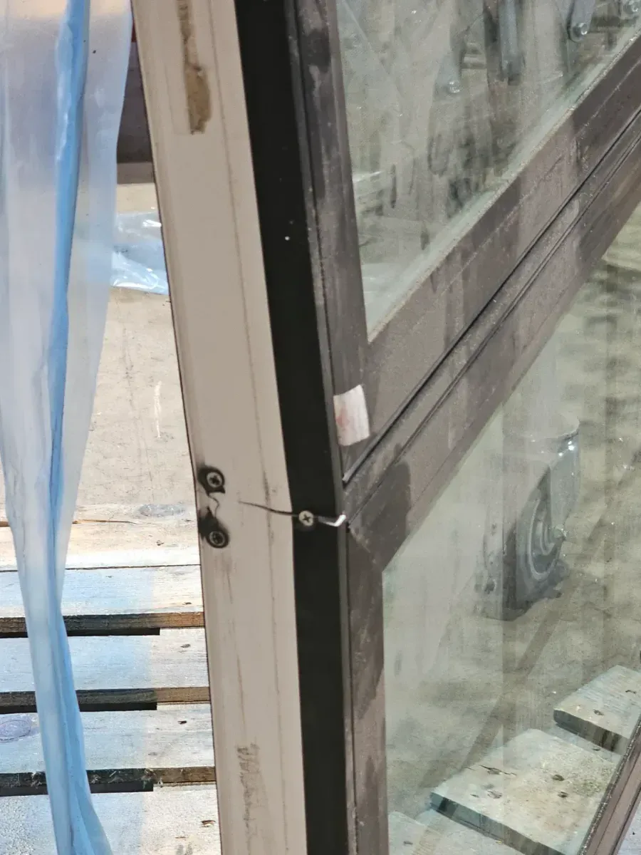 48 in. x 48 in. V-4500 Series Bronze FiniShield Vinyl Right-Handed Sliding Window with Colonial Grids/Grilles - image 4