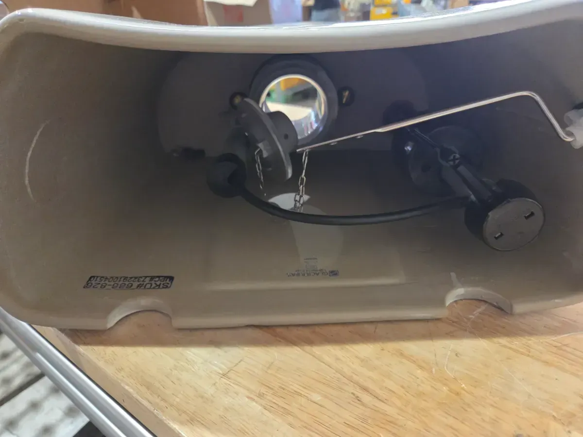 12 in. Rough In Two-Piece 1.28 GPF Single Flush Round Toilet in Biscuit, Seat Included - image 5