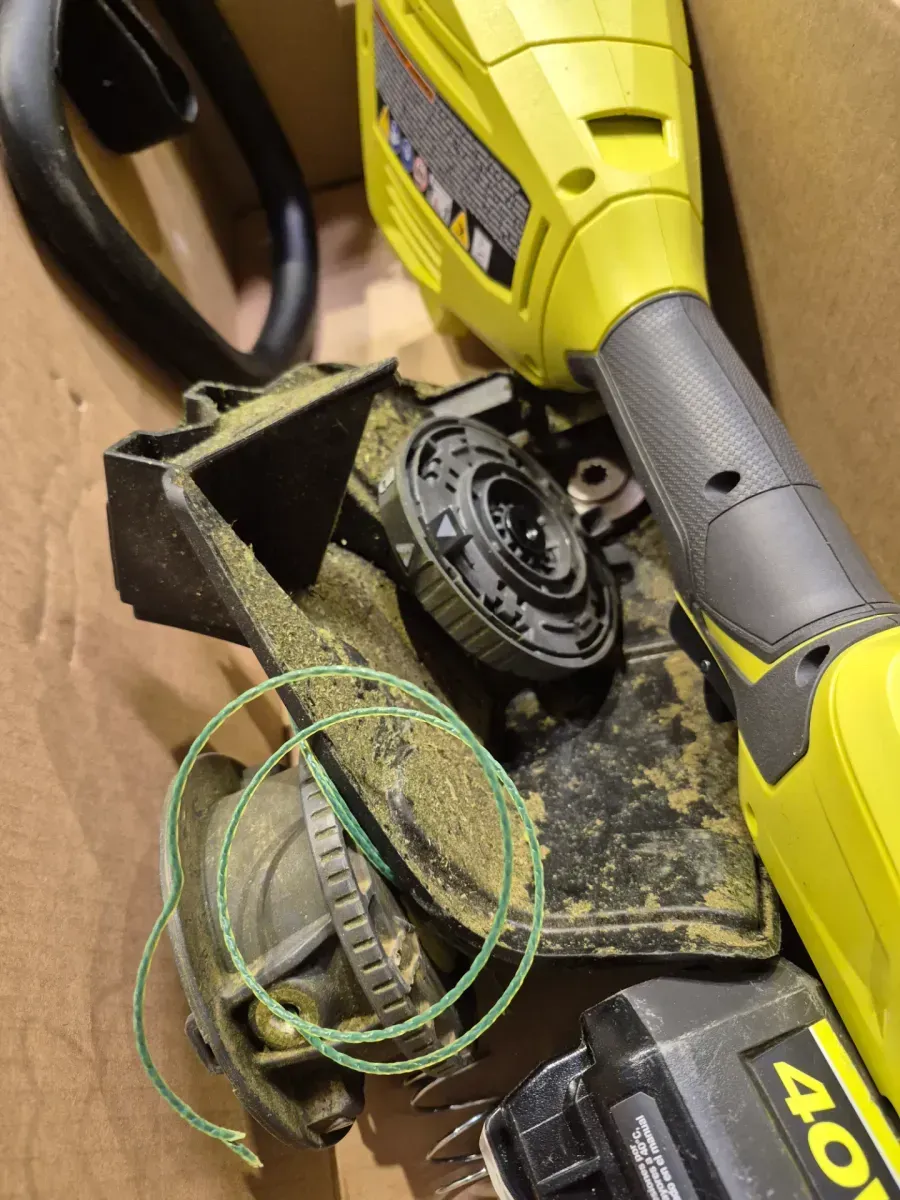 ***It is dirty.***Without charger***40V 15 in. Cordless String Trimmer with 4.0 Ah Battery and Charger and 0.080 in. x 16 ft. Spiral Line (5-Pack) - image 6