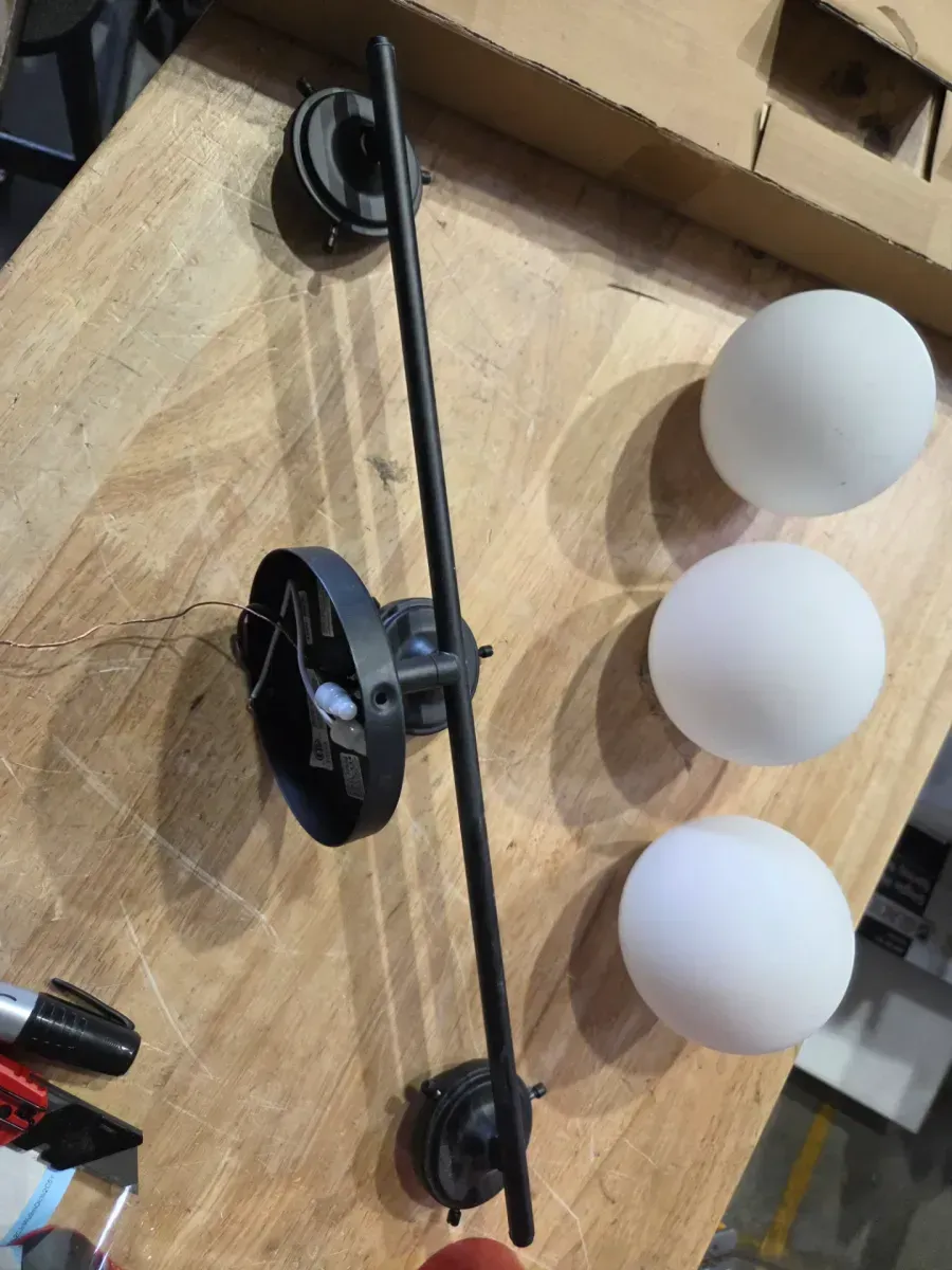 Wynton 24 in. 3-Light Black Mid-Century Modern Bathroom Vanity Light with Satin Etched Cased Opal Glass - image 3