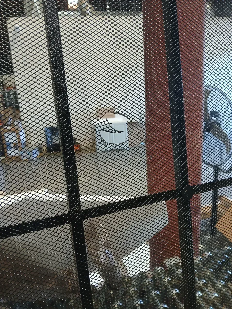 ***minor damage **32 in. x 80 in. Su Casa Universal Black Surface Mount Steel Security Door with Expanded Metal Screen - image 4