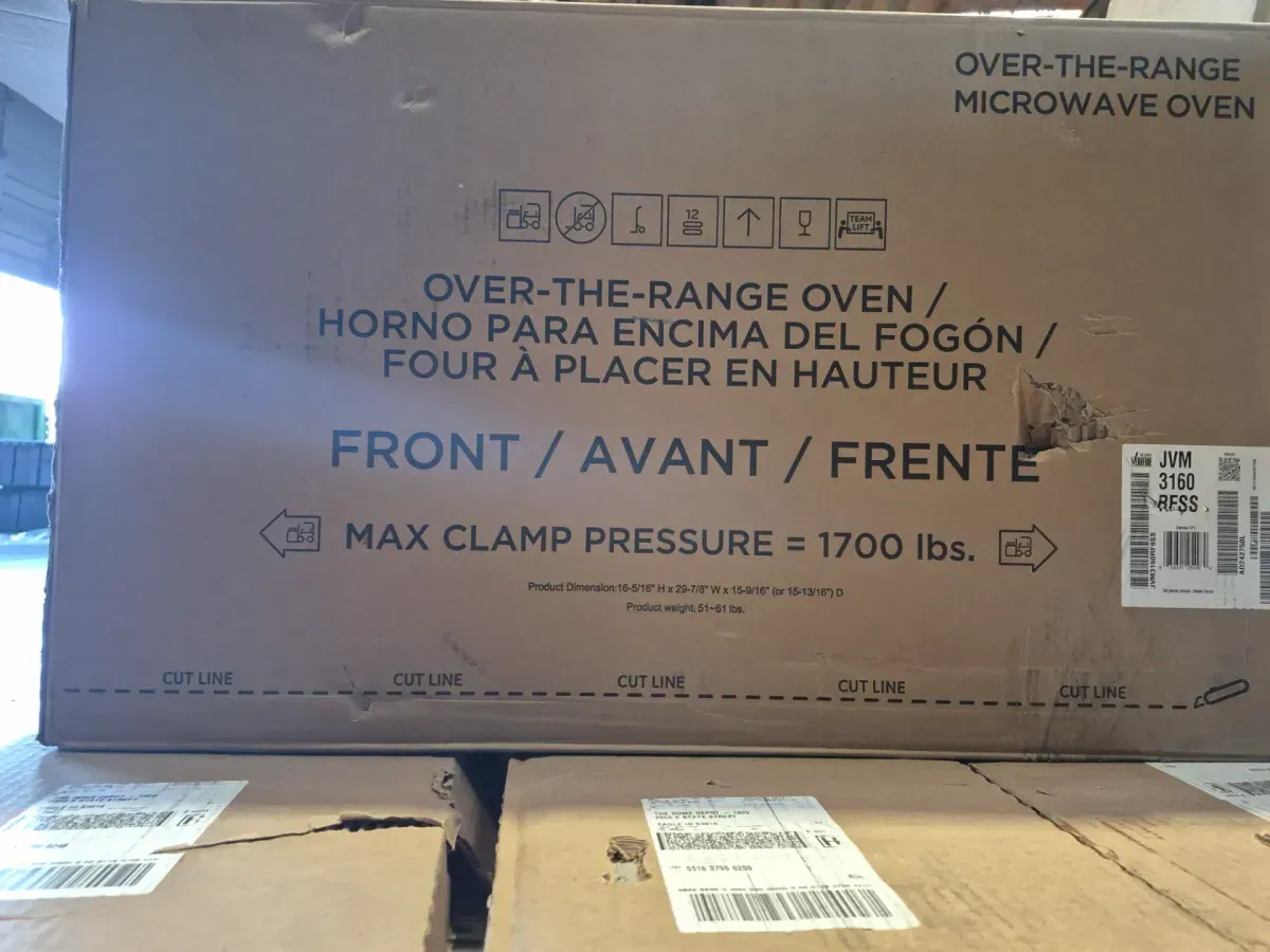 *has a dent* 2.1 cu. ft. 1000 W Fingerprint Resistant Stainless Steel Over-the-Range Microwave with Wi-Fi - image 2