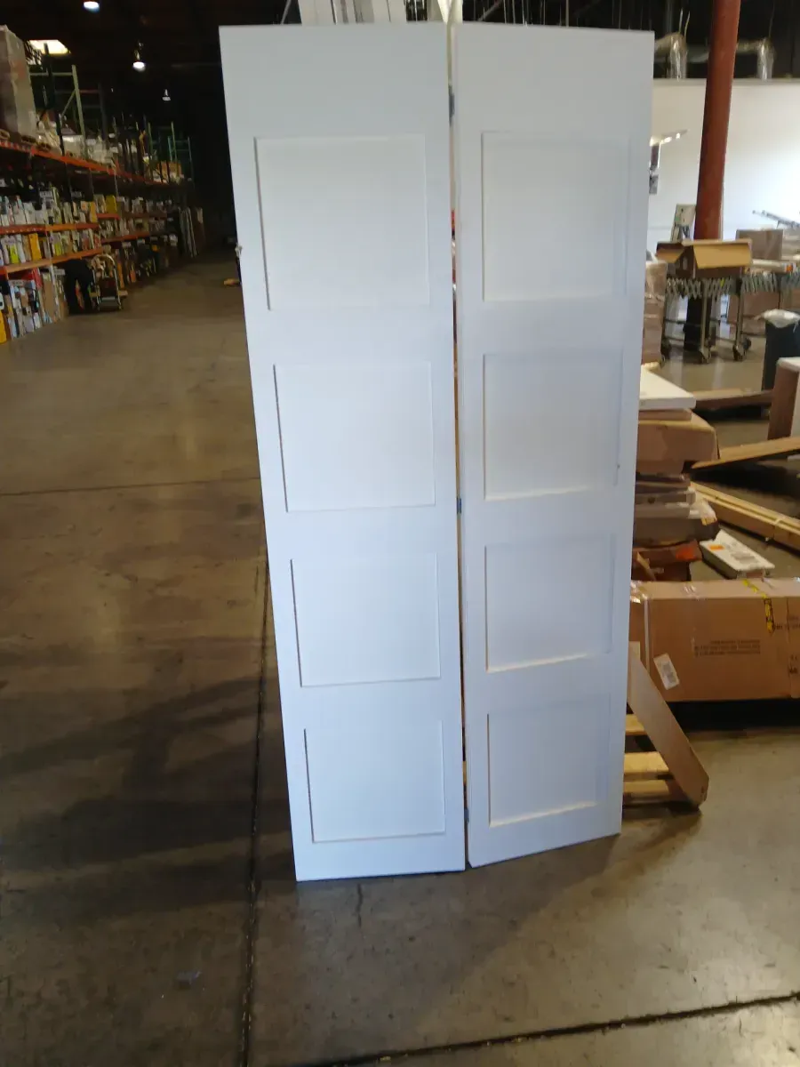 ***minor dents ***36 in. x 80 in. Solid Wood Primed White Unfinished MDF 4-Panel Bi-Fold Door with Hardwarewŵ - image 3