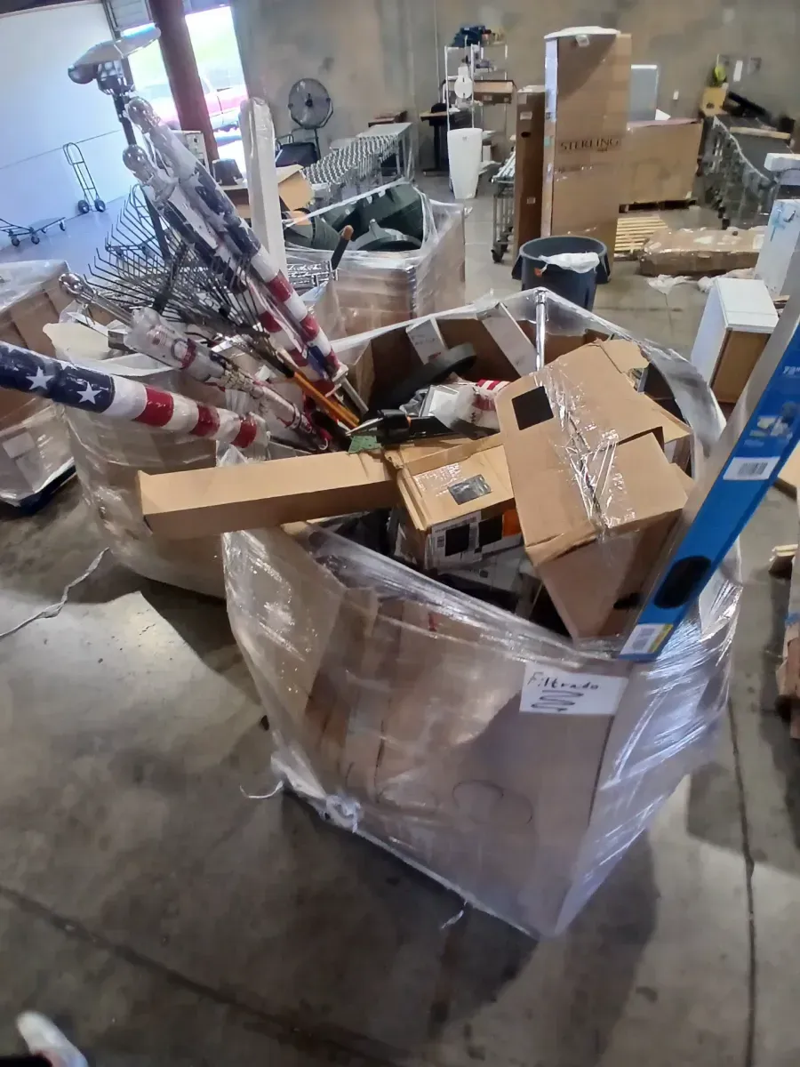 Pallet of Mixed General Merchandise with Tiki Torches and Tools - image 1