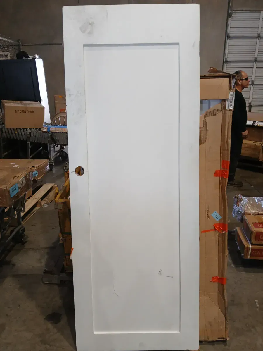***  has crack on the handle part and is damaged from the top part ***?30 in. x 80 in. x 1-3/8 in. Shaker White Primed 1-Panel Solid Core Wood Interior Slab Door - image 2