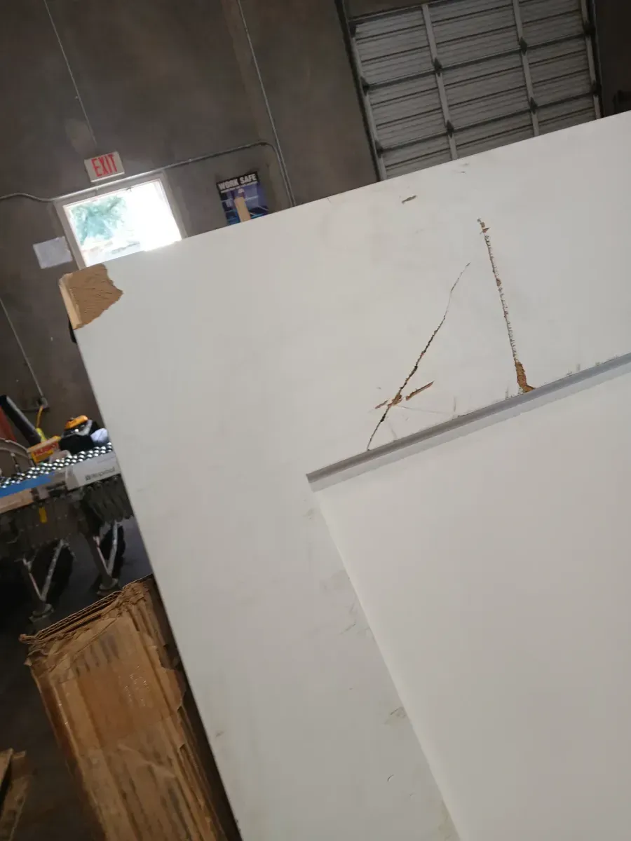 ***  has crack on the handle part and is damaged from the top part ***?30 in. x 80 in. x 1-3/8 in. Shaker White Primed 1-Panel Solid Core Wood Interior Slab Door - image 5