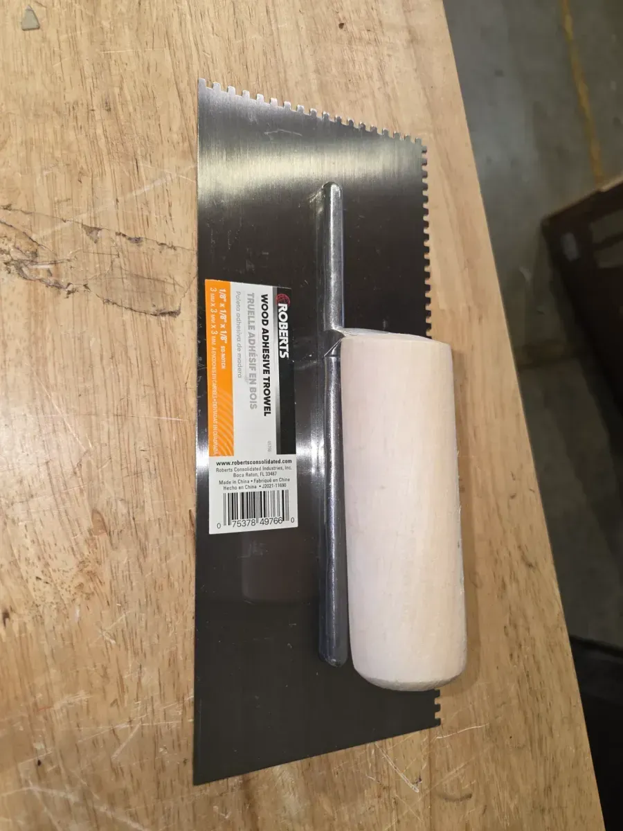 1/8 in. x 1/8 in. x 1/8 in. Square Notch Pro Wood Flooring Trowel with Wood Handle - image 1