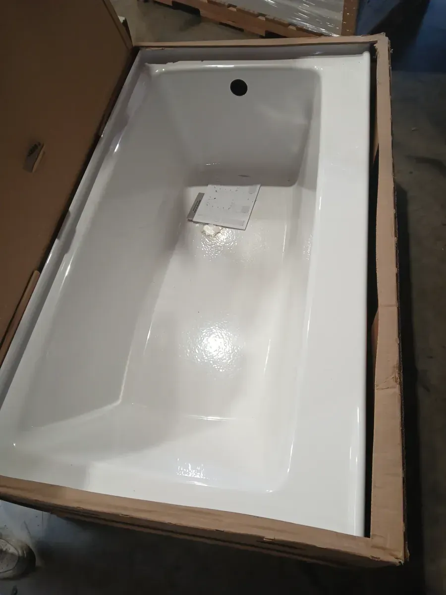 A  Pallet of 4 different  size ,style and brand  bathtubs  - image 1