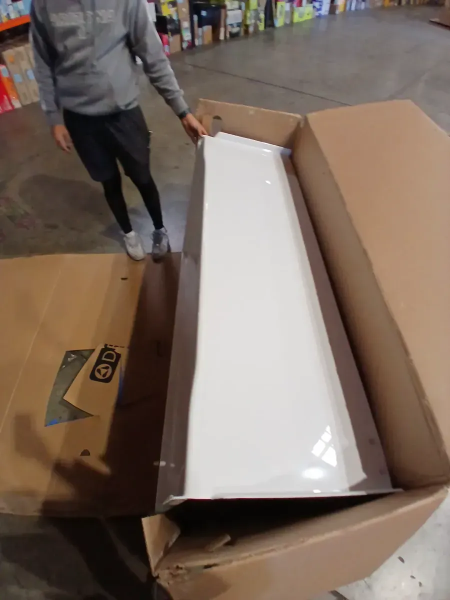 A pallet of bathtubs in various sizes and shapes; one of the four is cracked at the corner. - image 5