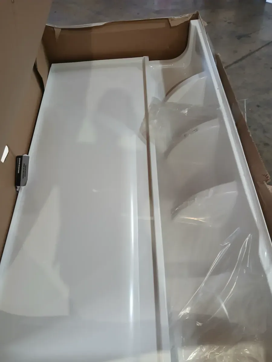 Pallet of different Shower wall sets up and Shower base  - image 1