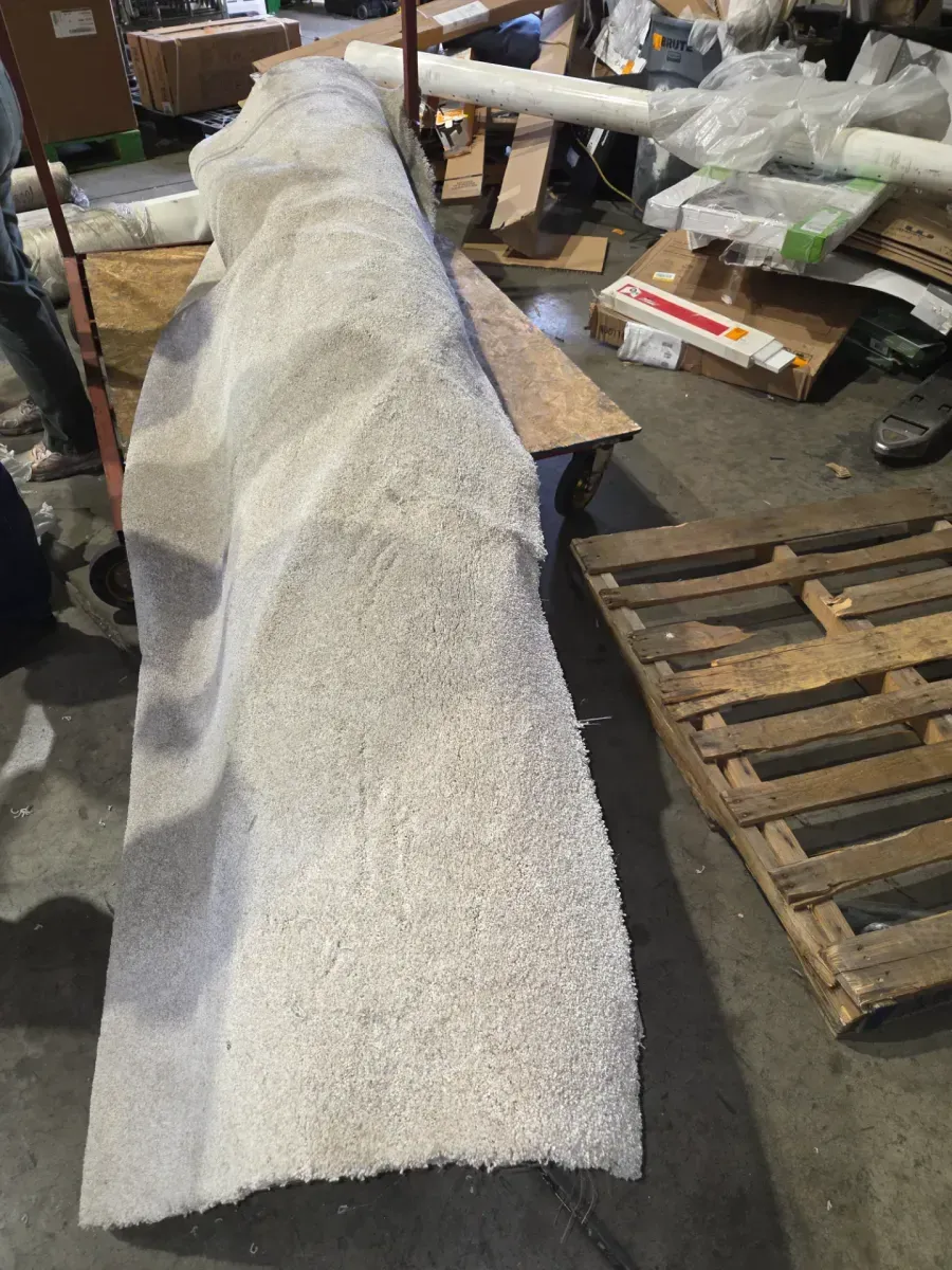 12-foot roll of carpet—length unknown. - image 1