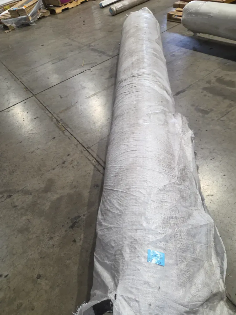 12-foot roll of carpet—length unknown. - image 1