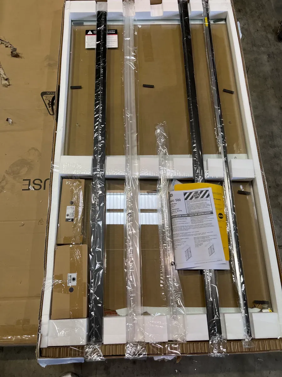 Classic 500 55-3/8 to 59-3/8 in. W x 59 in. H Frameless Sliding Bathtub Door in Matte Black with 1/4 in. Clear Glass - image 2