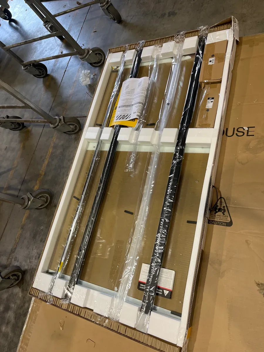 Classic 500 55-3/8 to 59-3/8 in. W x 59 in. H Frameless Sliding Bathtub Door in Matte Black with 1/4 in. Clear Glass - image 3