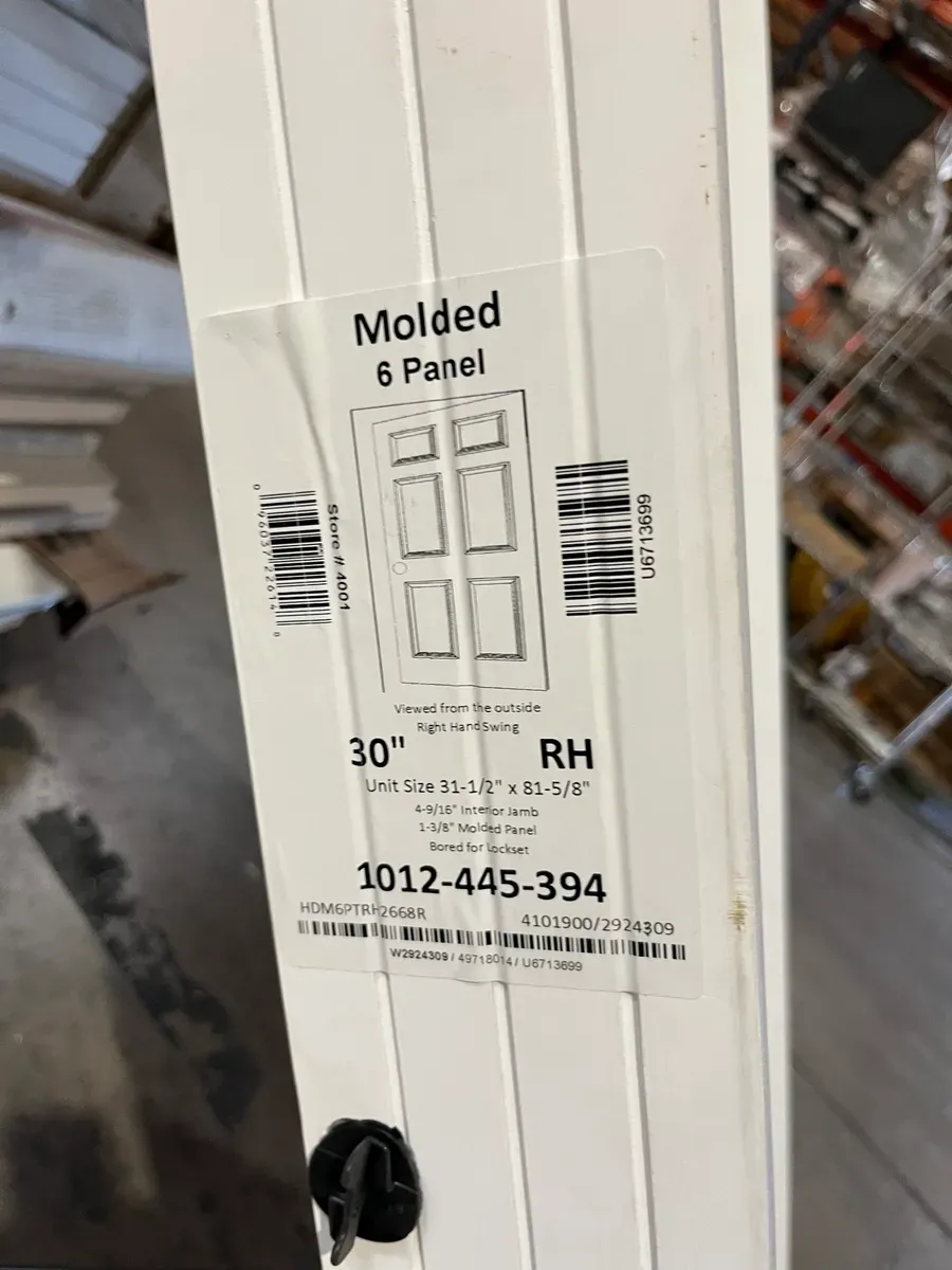 *** It's stained, the door looks in very good condition***“31-1/2 in. x 81-5/8 in” 6 Panel Colonist Primed Right-Hand Textured Solid Core Molded Composite MDF Single Prehung Interior Door - image 3