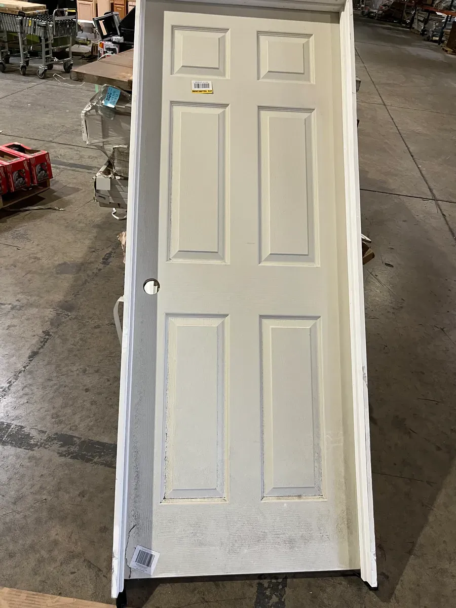 *** It's stained, the door looks in very good condition***“31-1/2 in. x 81-5/8 in” 6 Panel Colonist Primed Right-Hand Textured Solid Core Molded Composite MDF Single Prehung Interior Door - image 4