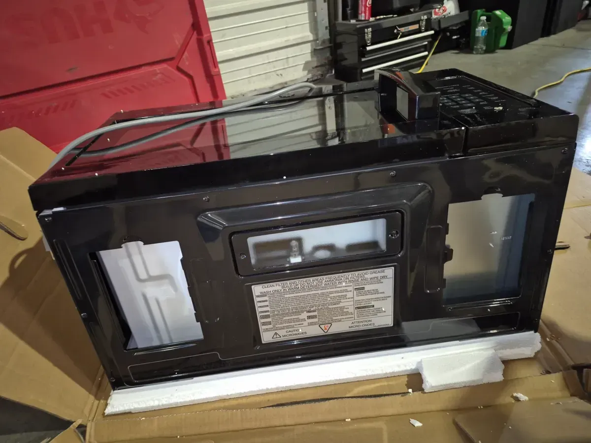 1.6 cu. ft. Over-the-Range Microwave in Black - image 6