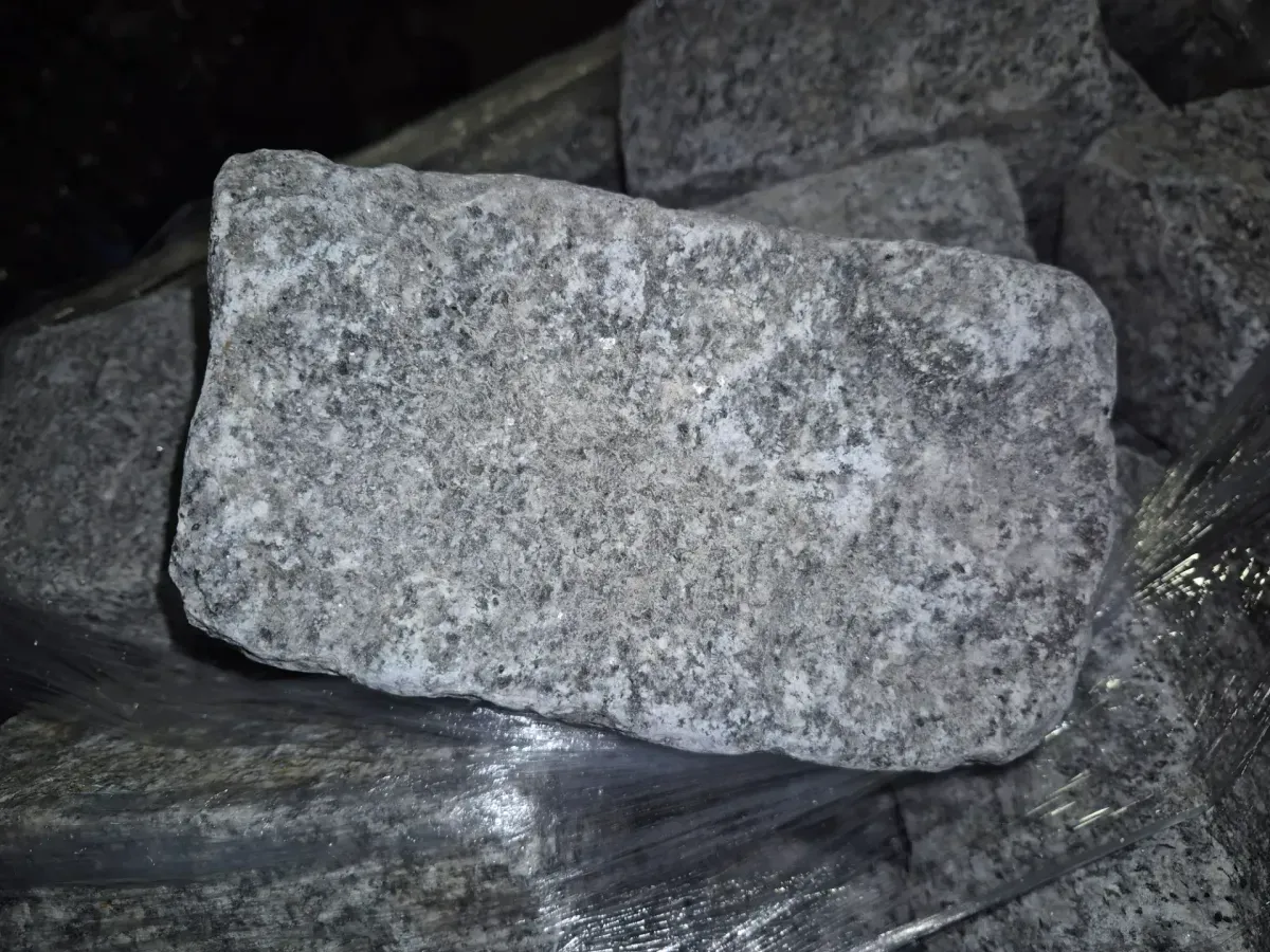 Pallet of Nantucket Pavers Cobblestone 10 in. x 7 in. x 4 in. Gray Granite Edger Kit  - image 1