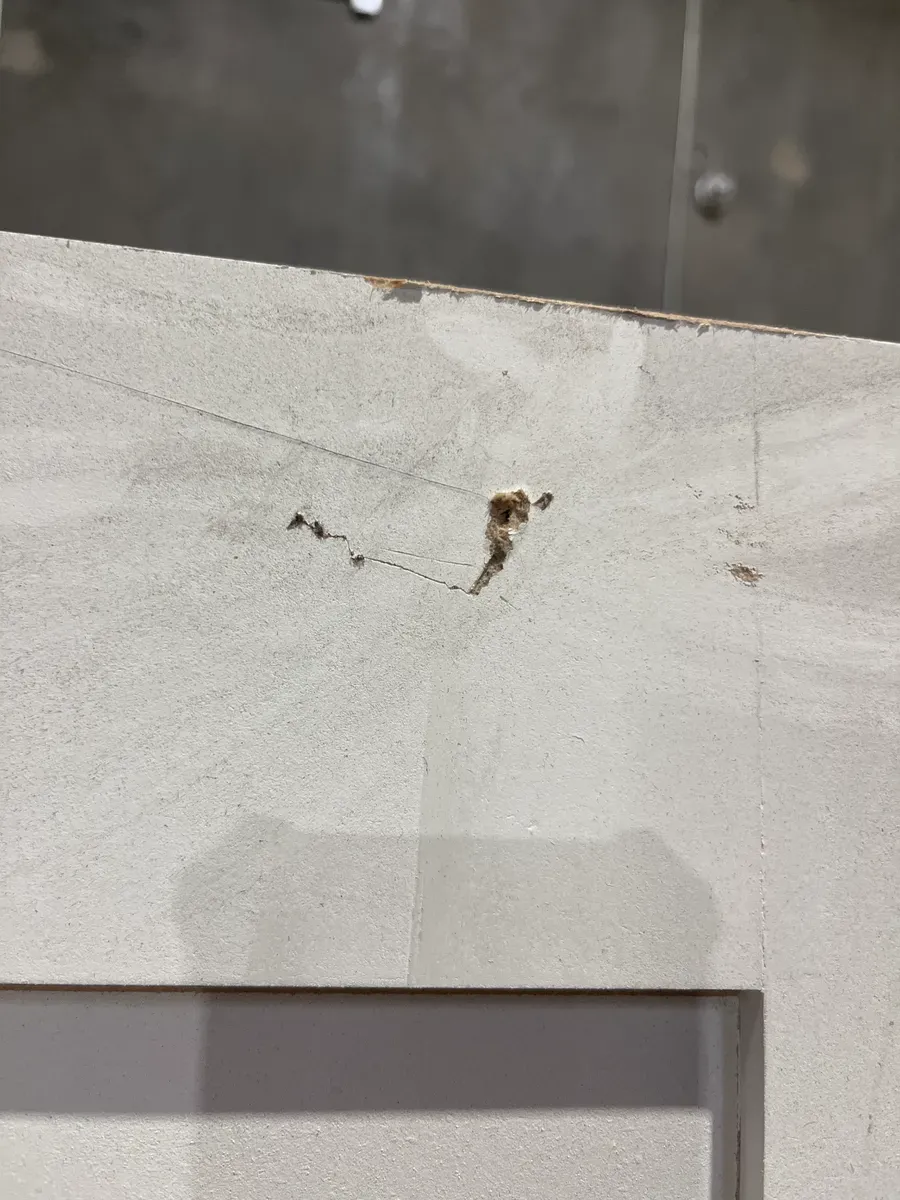 **has minor dents**32in. x 80 in. x 1-3/8 in. Shaker White Primed 2-Panel Solid Core Wood Interior Slab Door - image 4