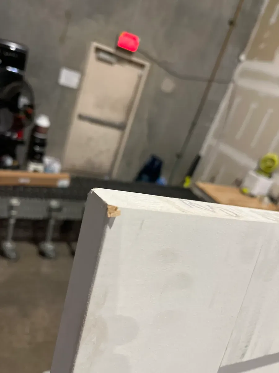 **has minor dents**32in. x 80 in. x 1-3/8 in. Shaker White Primed 2-Panel Solid Core Wood Interior Slab Door - image 6