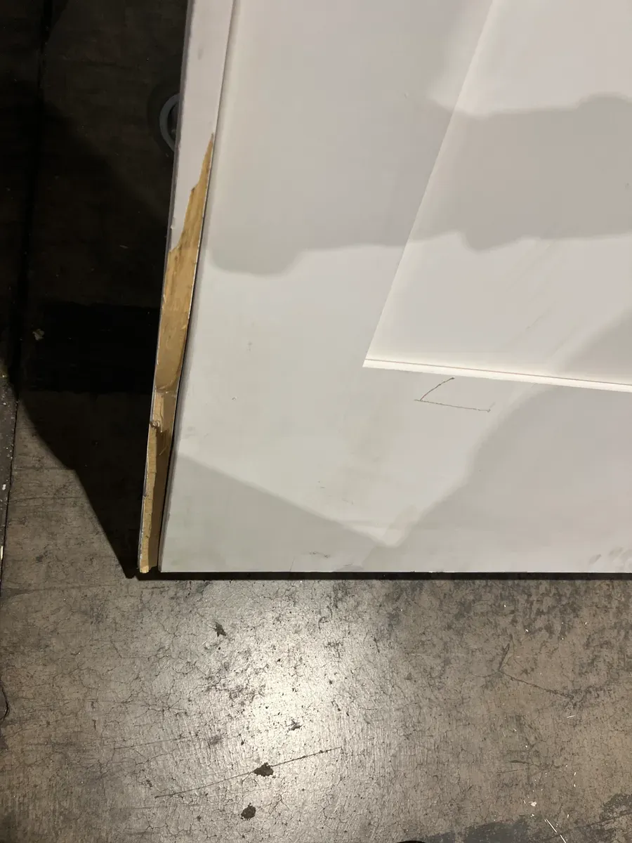 **frame is a little bit of damage in the door has minor dents **32 in. x 80 in. Shaker 1-Panel Primed Solid Hybrid Core MDF Left-Hand Single Prehung Interior Door - image 6