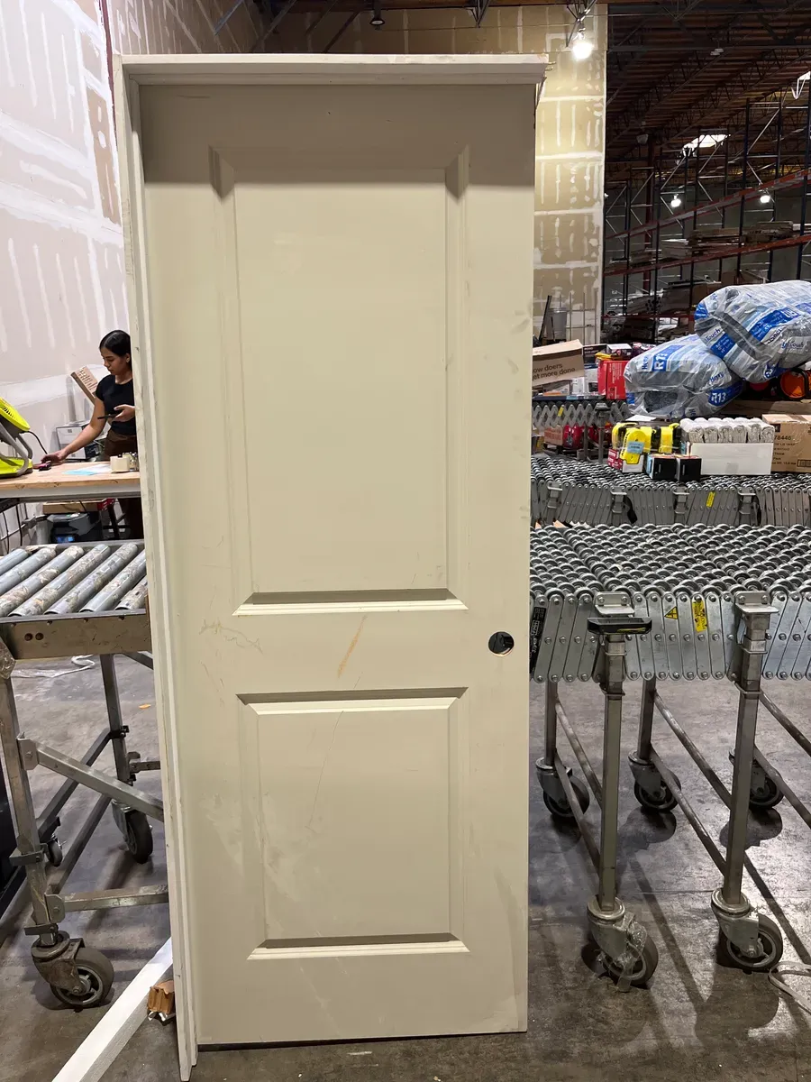 **frame is broken and the door is a bit dirty ***30 in. x 80 in. 2-Panel Square Top Left Hand Solid Core White Primed Molded Single Prehung Interior Door w/Nickel Hing - image 4