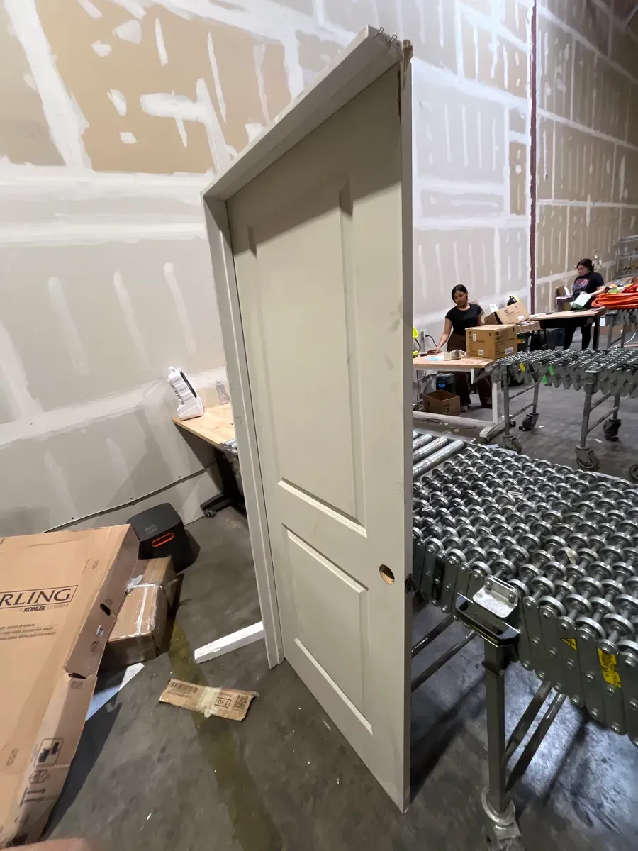 **frame is broken and the door is a bit dirty ***30 in. x 80 in. 2-Panel Square Top Left Hand Solid Core White Primed Molded Single Prehung Interior Door w/Nickel Hing - image 5