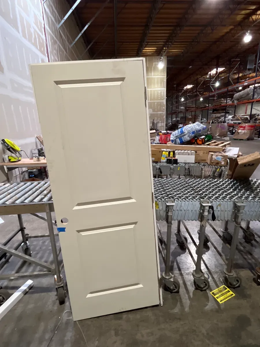 **frame is broken and the door is a bit dirty ***30 in. x 80 in. 2-Panel Square Top Left Hand Solid Core White Primed Molded Single Prehung Interior Door w/Nickel Hing - image 5