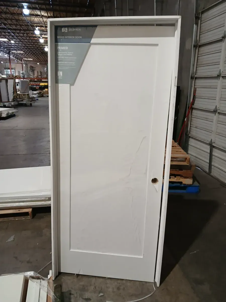 **damge frame and has a scratch on the top**33 in. x 80 in. Madison White Painted Right-Hand Smooth Solid Core Molded Composite MDF Single Prehung Interior Door - image 2