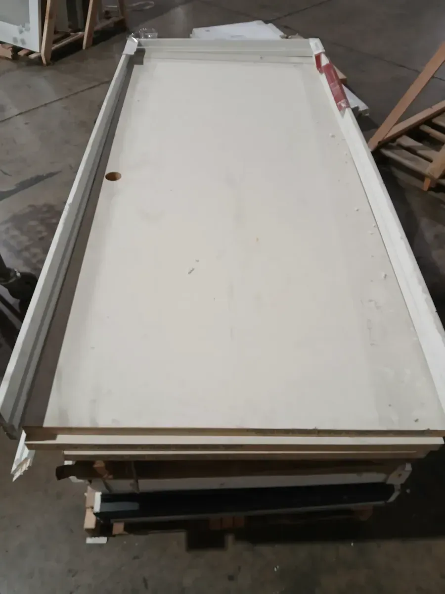 **frame is broken in yye door handle part has a little crack **36 in. x 80 in. No Panel Right-Handed Primed Composite Hollow Core Single Prehung Interior Door 4-9/16 in. Flat Jamb - image 2