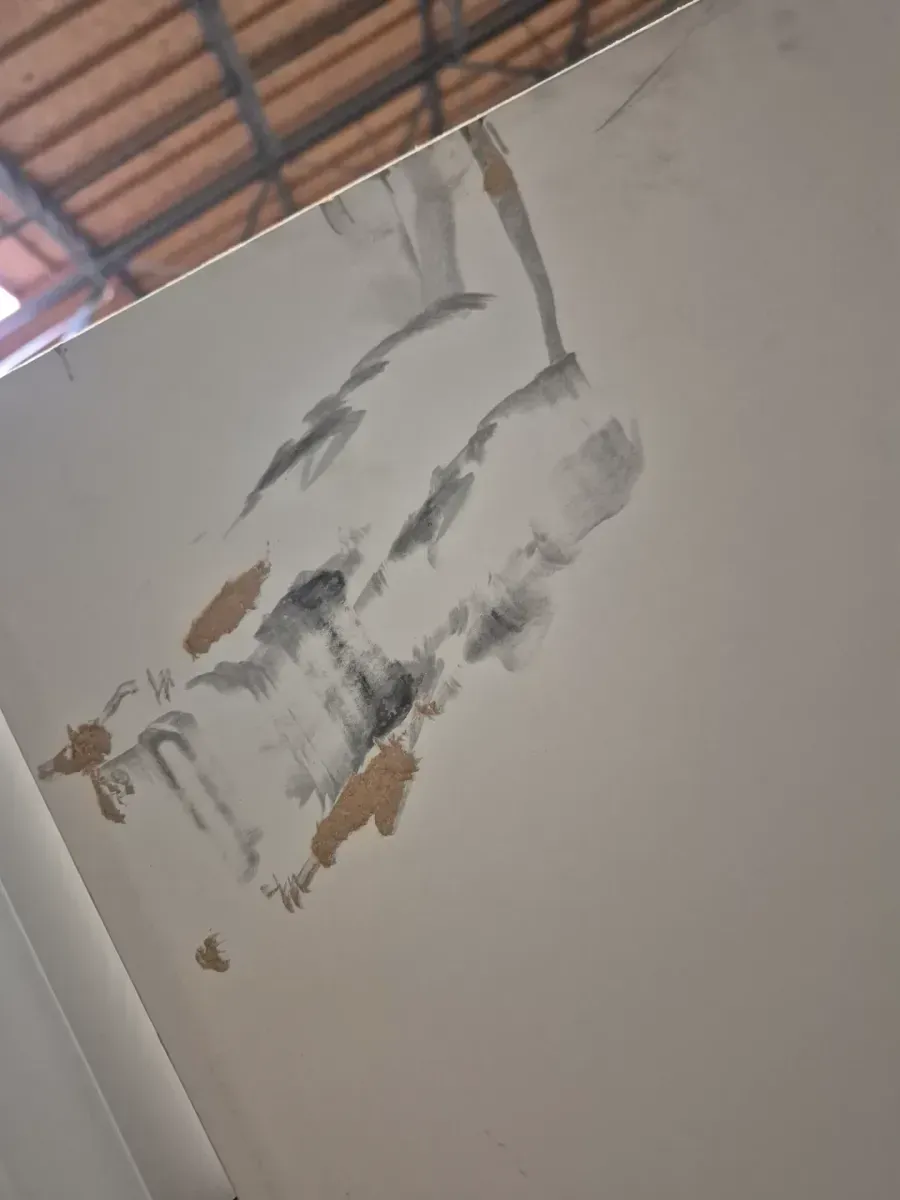 **frame is broken in yye door handle part has a little crack **36 in. x 80 in. No Panel Right-Handed Primed Composite Hollow Core Single Prehung Interior Door 4-9/16 in. Flat Jamb - image 3