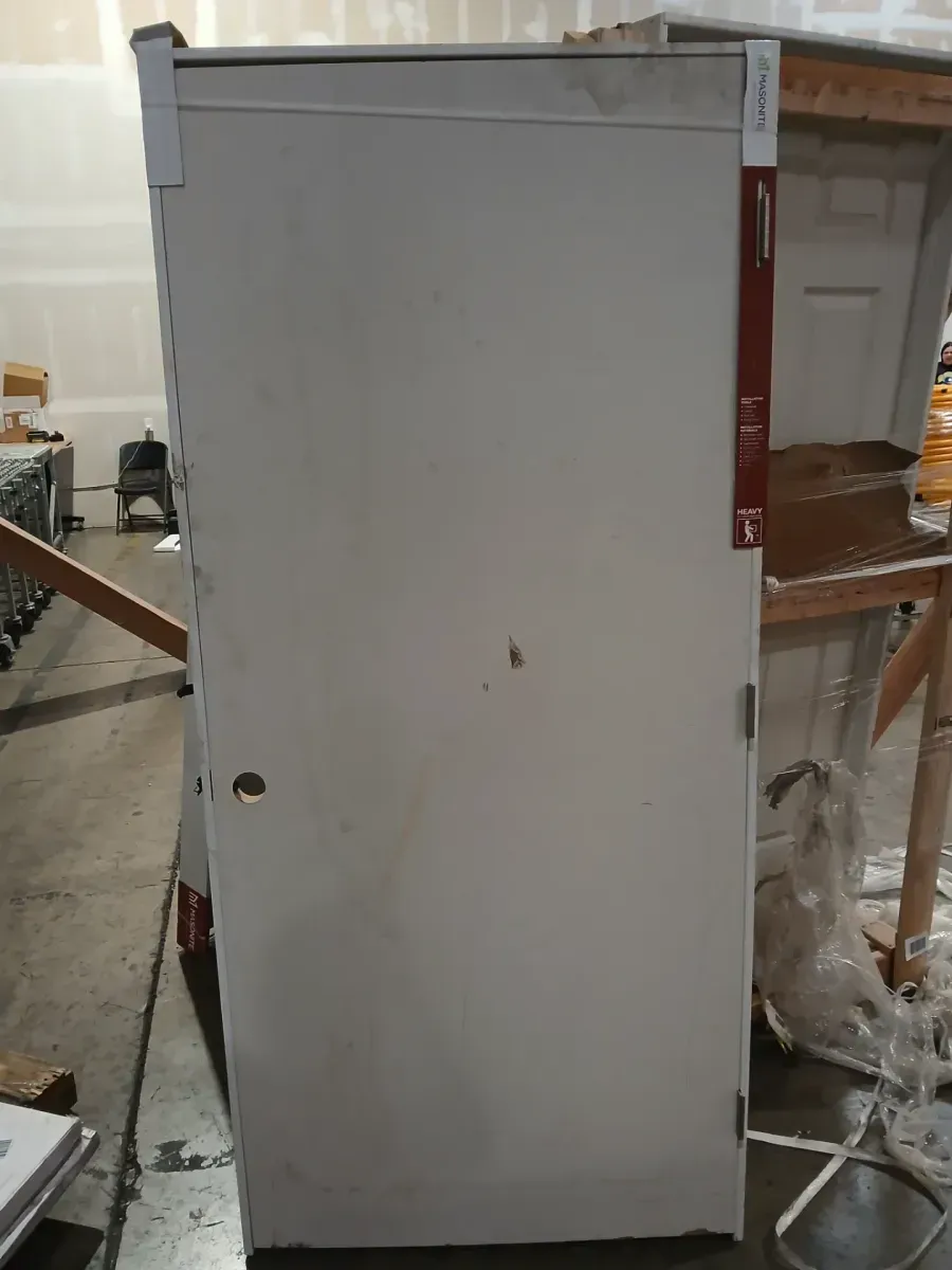 **has minor dents snd scratches **036 in. x 80 in. No Panel Left-Handed Primed Composite Hollow Core Single Prehung Interior Door 4-9/16 in. Flat Jamb - image 2