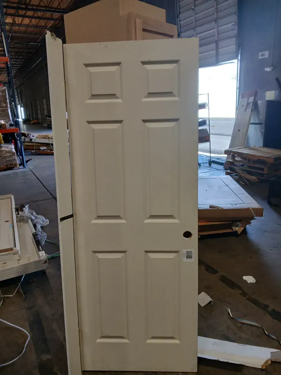 **broken frame and minor dent**29.10 in. x 80 in. 6 Panel Right-Handed Primed Composite Hollow Core Single Prehung Interior Door 4-9/16 in. Flat Jamb - image 4