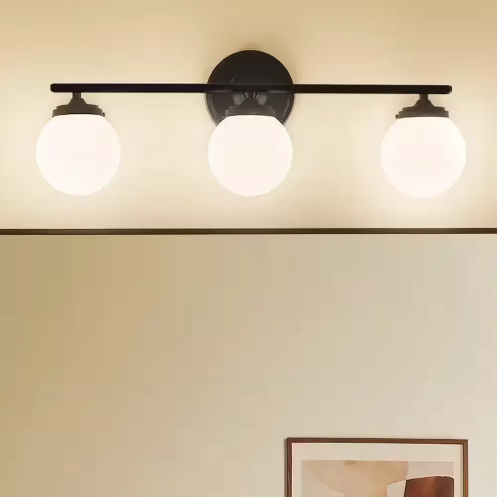 Wynton 24 in. 3-Light Black Mid-Century Modern Bathroom Vanity Light with Satin Etched Cased Opal Glass - image 1