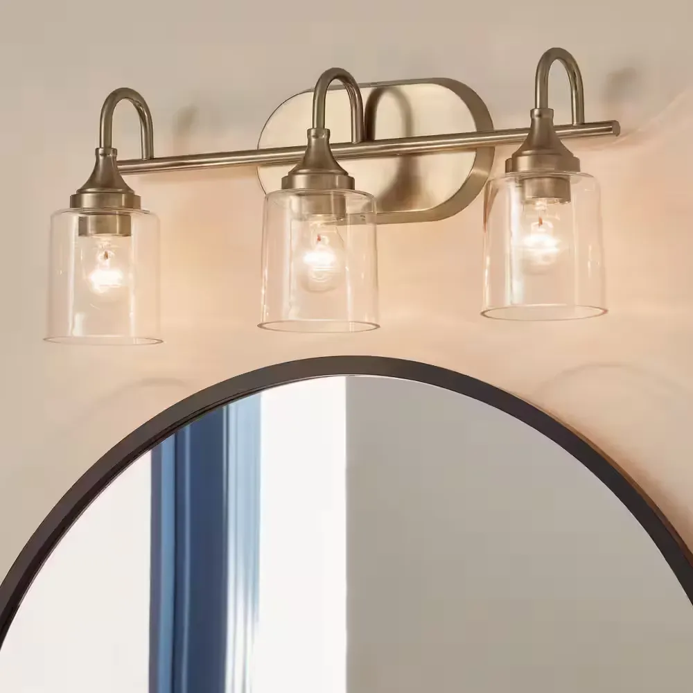Erta 24 in. 3-Light Champagne Bronze Bathroom Vanity Light with Clear Glass Shades - image 1
