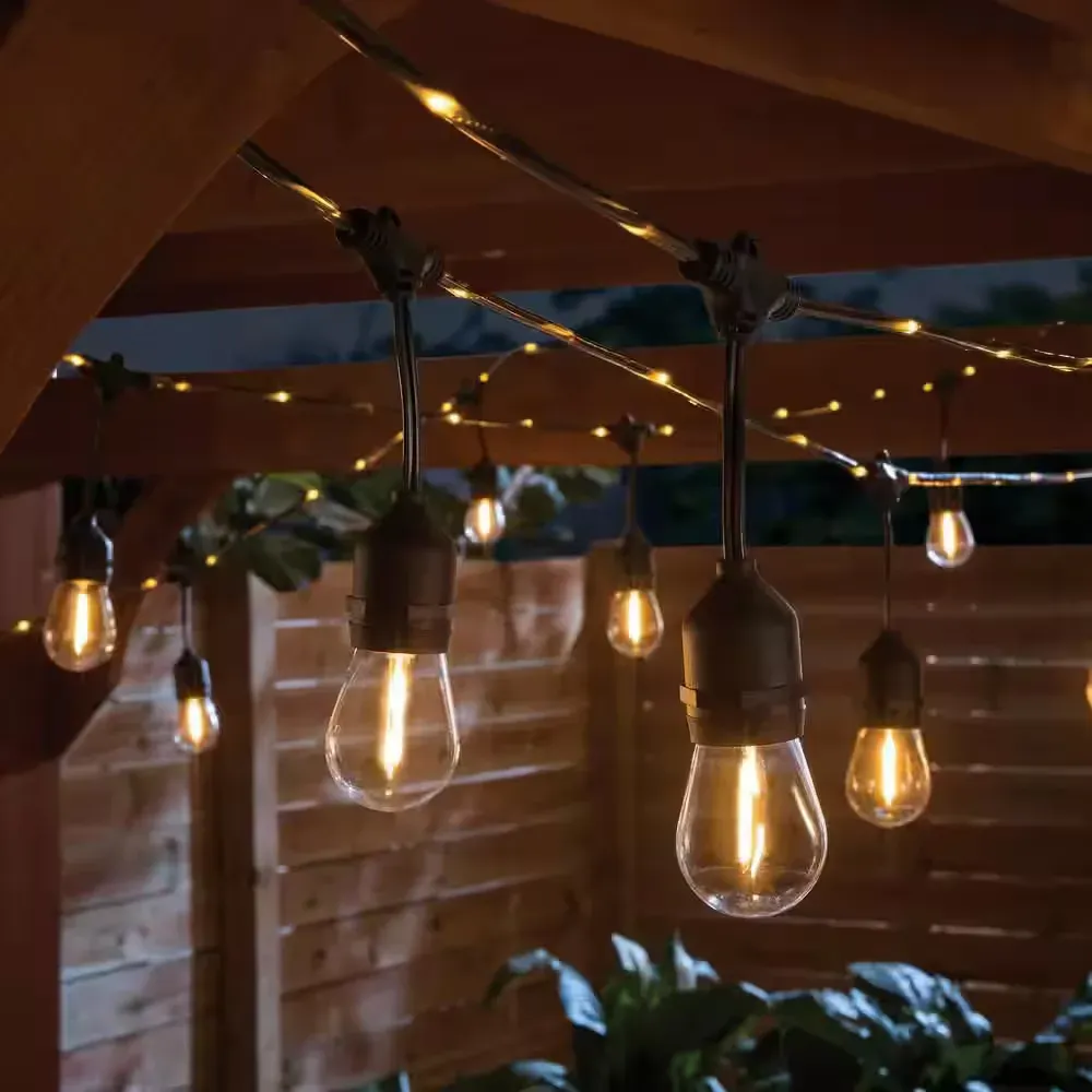 12-Light 24 ft. Indoor/Outdoor Plug-In Filament LED S14 Edison Bulb and Embedded Firefly Rope Lights String-Light - image 1