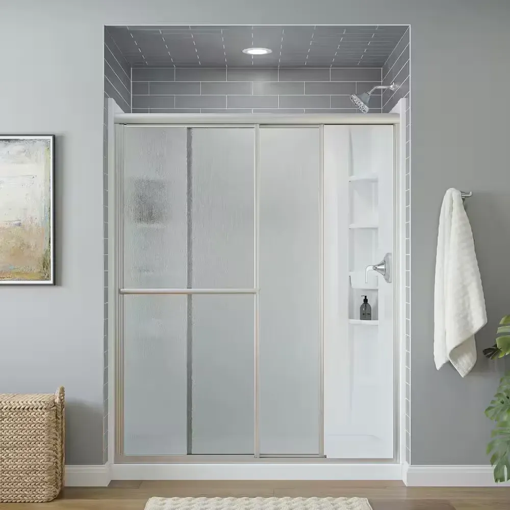 Deluxe 55-60 in. W x 70 in. H Framed Sliding Shower Door in Silver with 1/8 in. Thick Rain Glass - image 1
